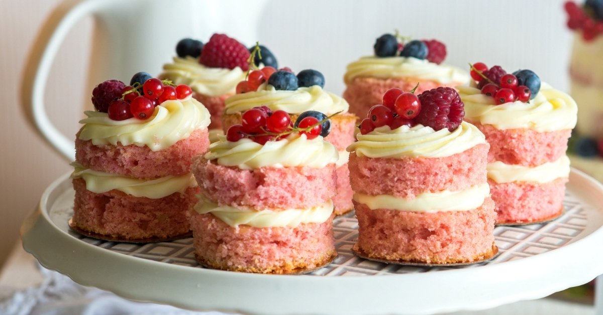 pink mini cakes with vanilla and berries
